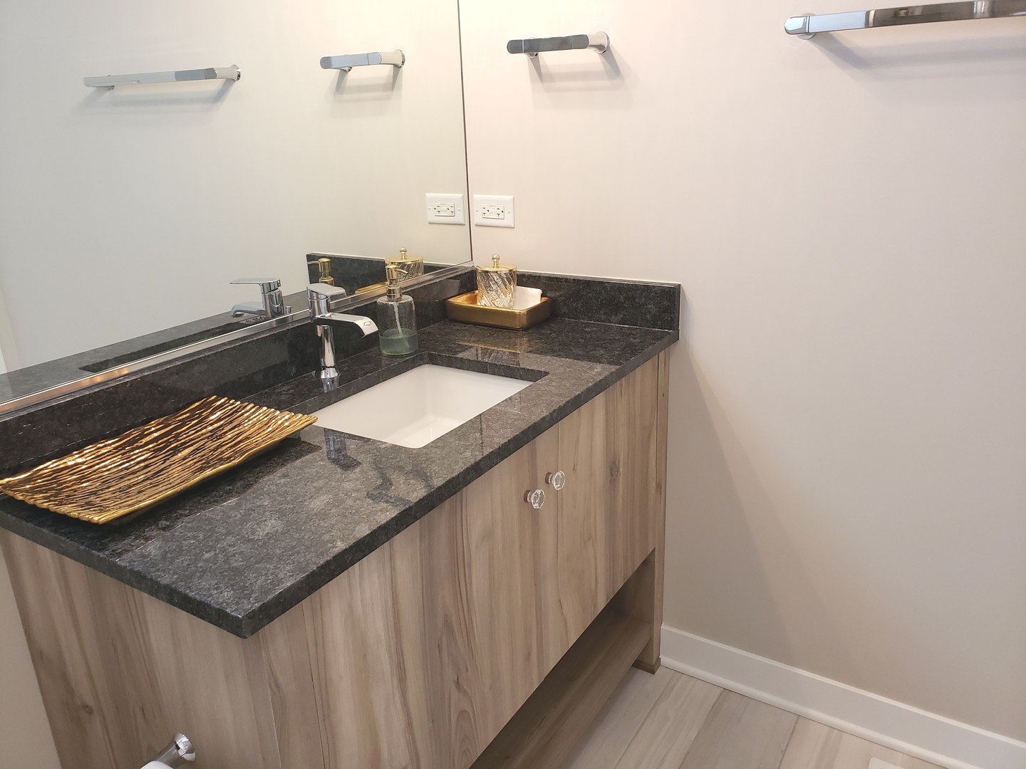 4327 Carpenter Road Naperville, IL 60564 - Photo 35 of 42 a bathroom with a sink and a mirror