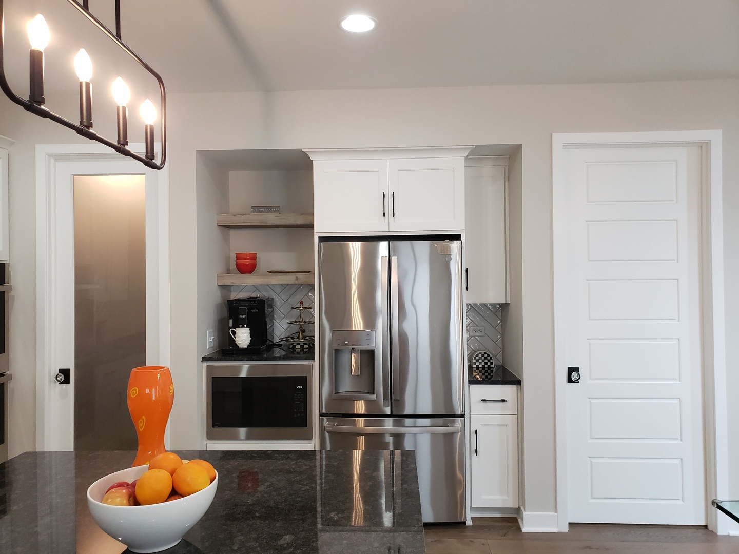 4327 Carpenter Road Naperville, IL 60564 - Photo 7 of 42 a kitchen with stainless steel appliances granite countertop a refrigerator and a sink
