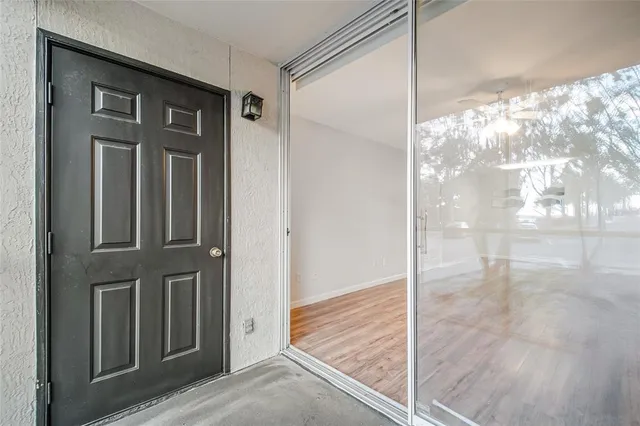 a view of a room with a large window