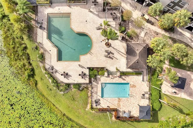 a view of a swimming pool with a patio
