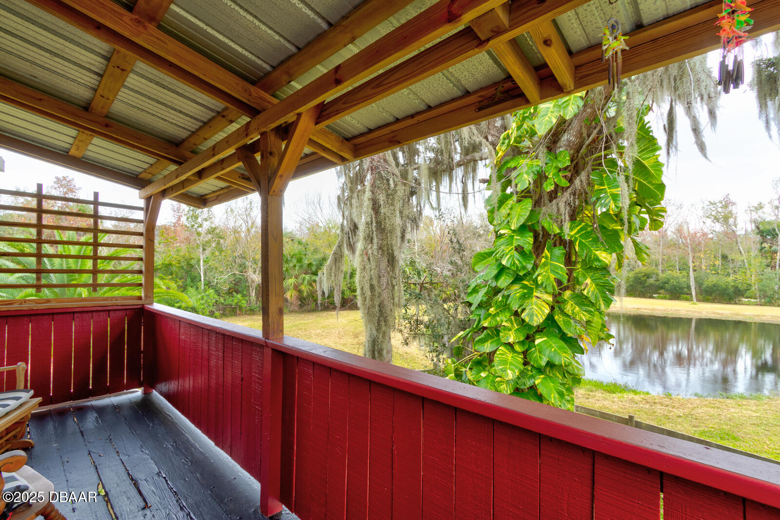 3051 Ragis Road Edgewater, FL 32132 - Photo 11 of 76 Bedroom -1 Balcony View of Front Pond