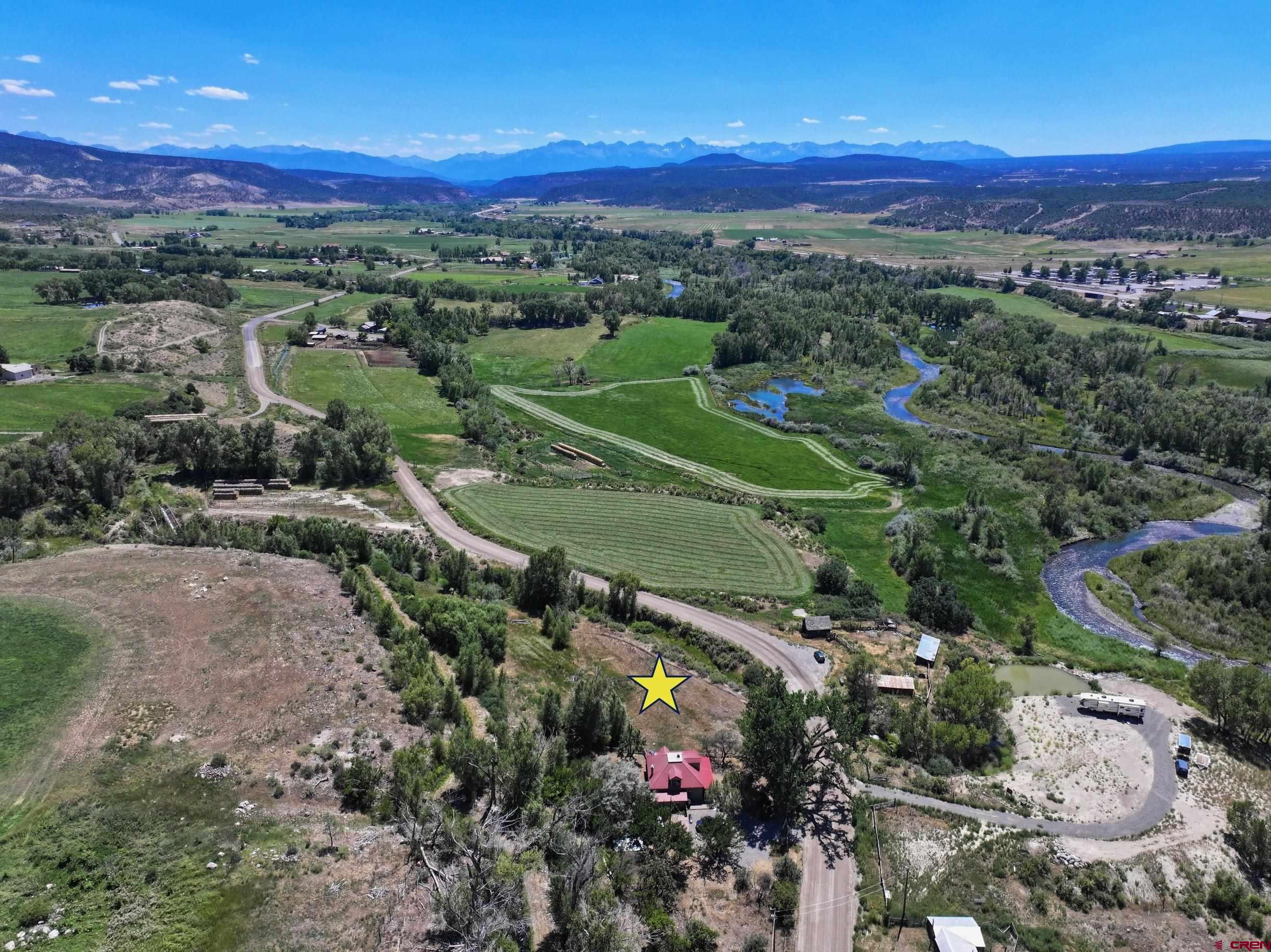 Tbd Lot 3 Uncompahgre Road Montrose, CO 81403 - Photo 9 of 9 an aerial view of a city