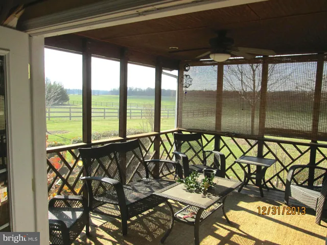 a view of a balcony with an outdoor space