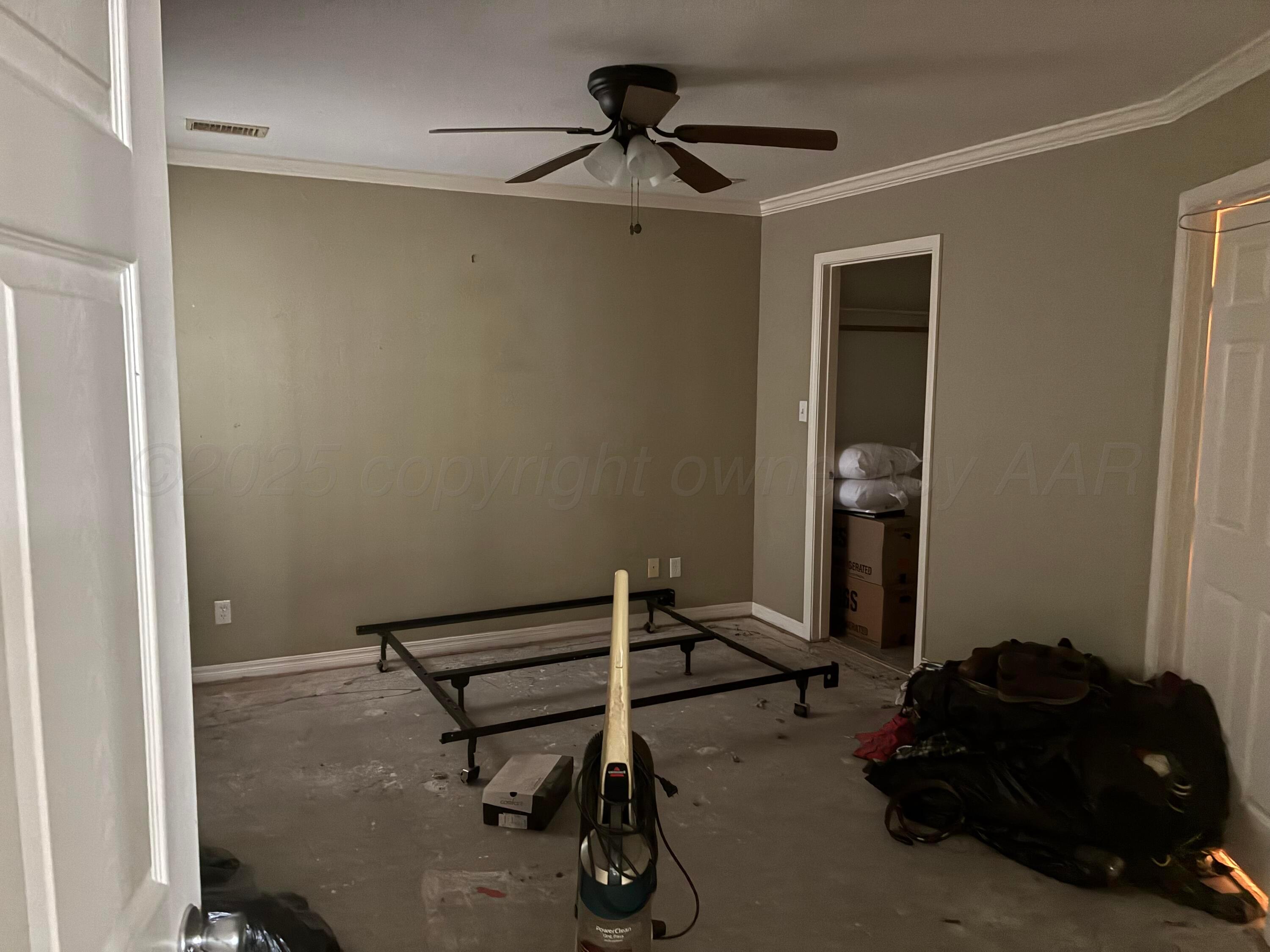 1912 Rimsite Drive Amarillo, TX 79118 - Photo 8 of 9 a room with gym equipment and wooden floor