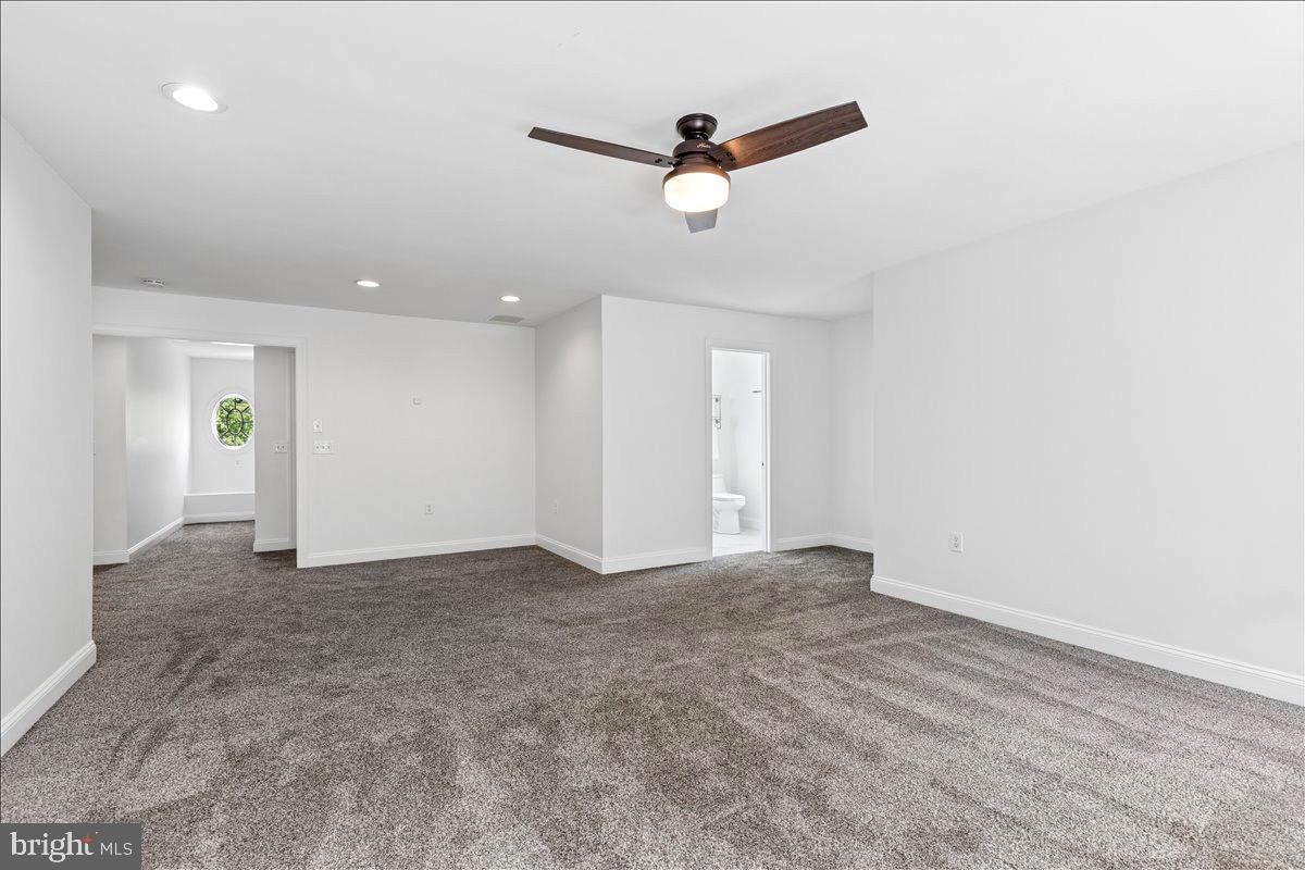 102 Little Neck Road Stevensville, MD 21666 - Photo 55 of 77 a view of a livingroom with a ceiling fan and window