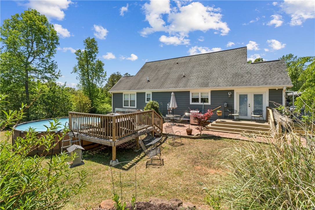 189 Little Choestoea Road Westminster, SC 29693 - Photo 30 of 38 This residence features an expansive outdoor area with a deck, pool, and ample space for entertaining.