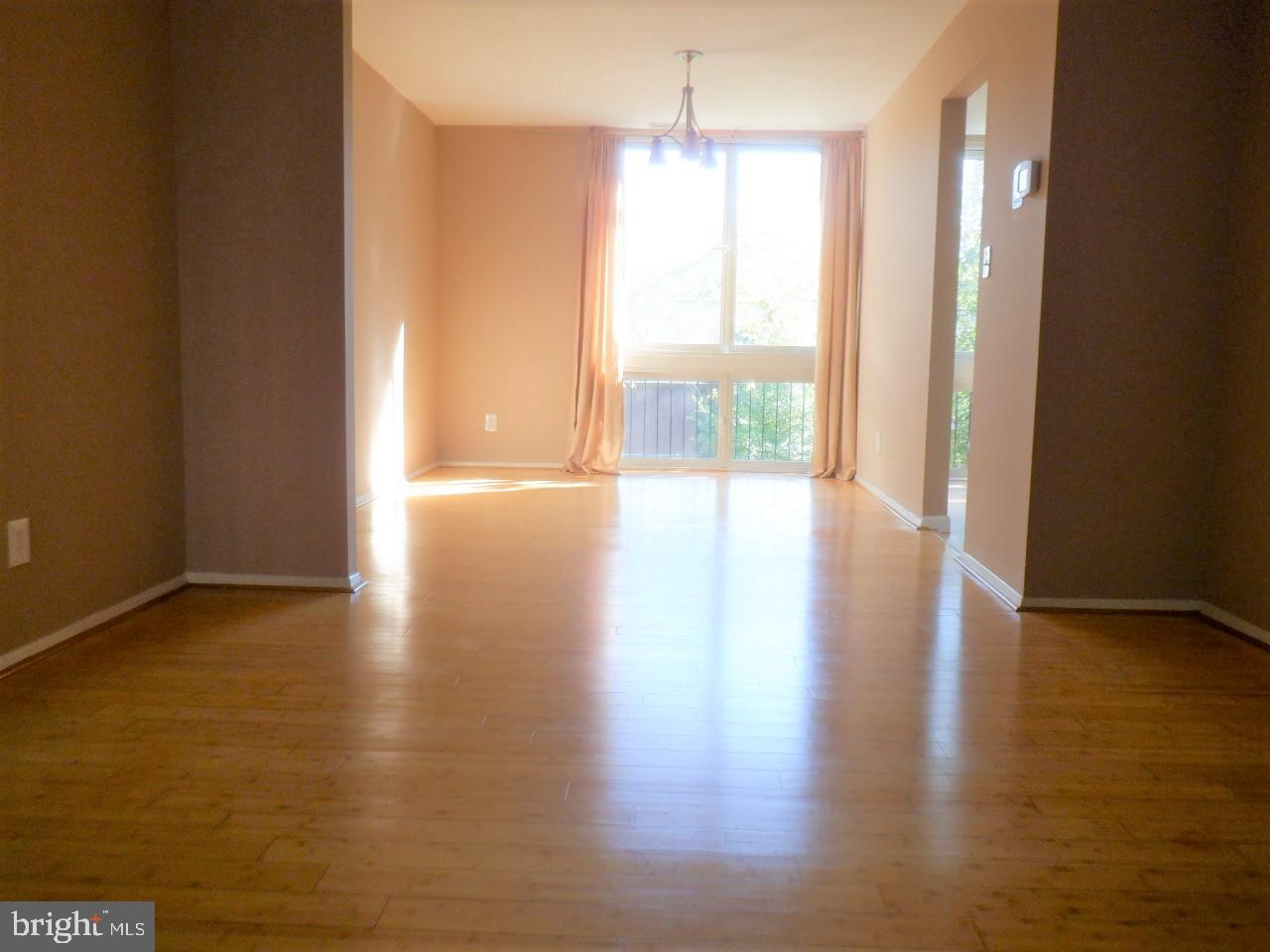 10410 Faulkner Ridge Circle, Unit 36 Columbia, MD 21044 - Photo 7 of 23 Living Rm leading to Dining Rm