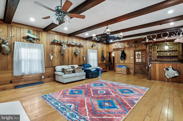 a bedroom with furniture and a chandelier