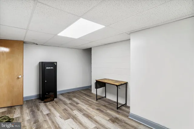 a view of entryway with wooden floor