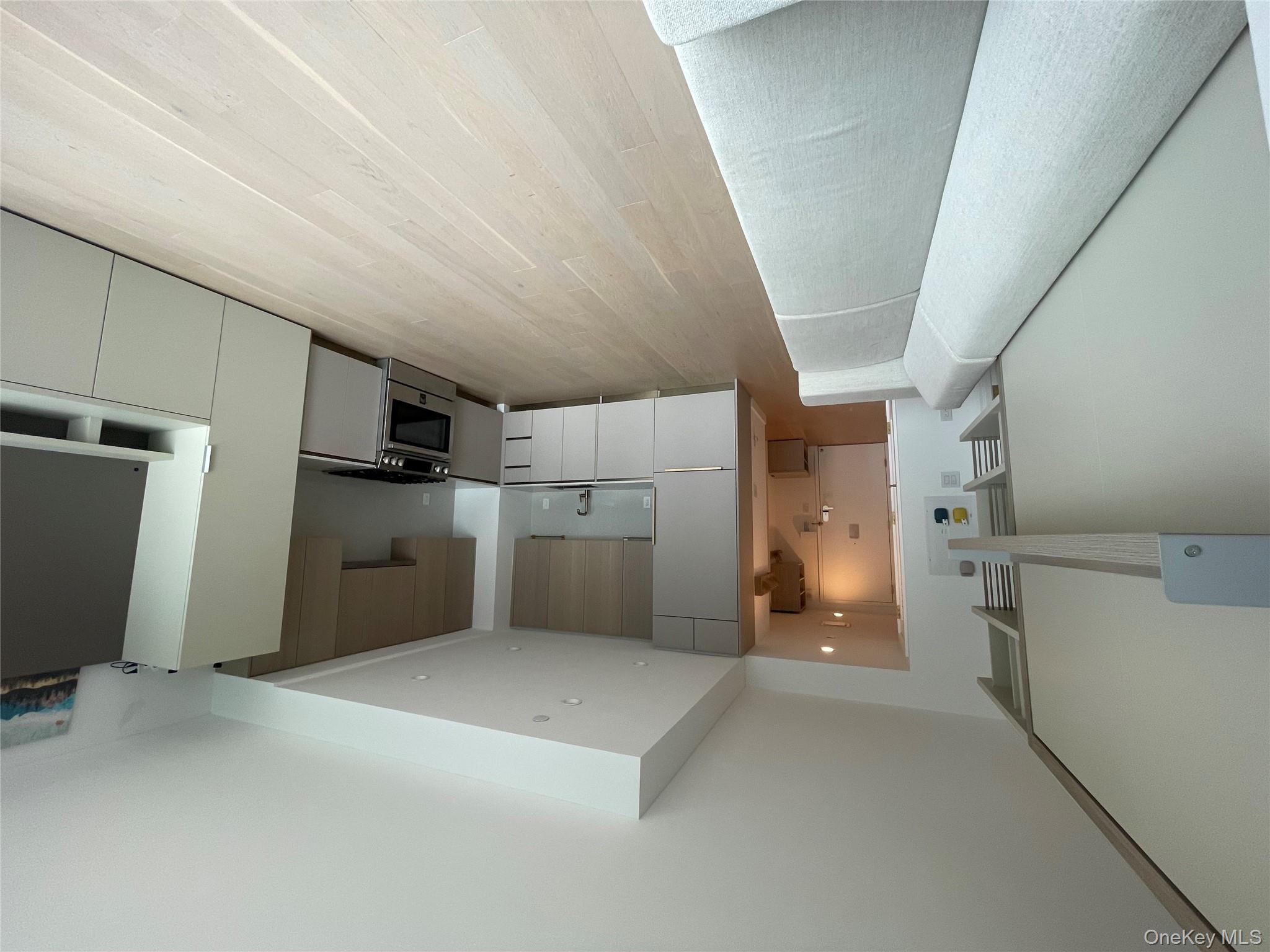 3 Court Square Queens, NY 11101 - Photo 2 of 7 a view of a kitchen with electric appliances