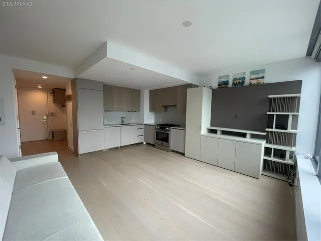 a bedroom with furniture and window