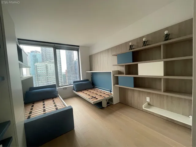 a view of workspace with wooden floor space