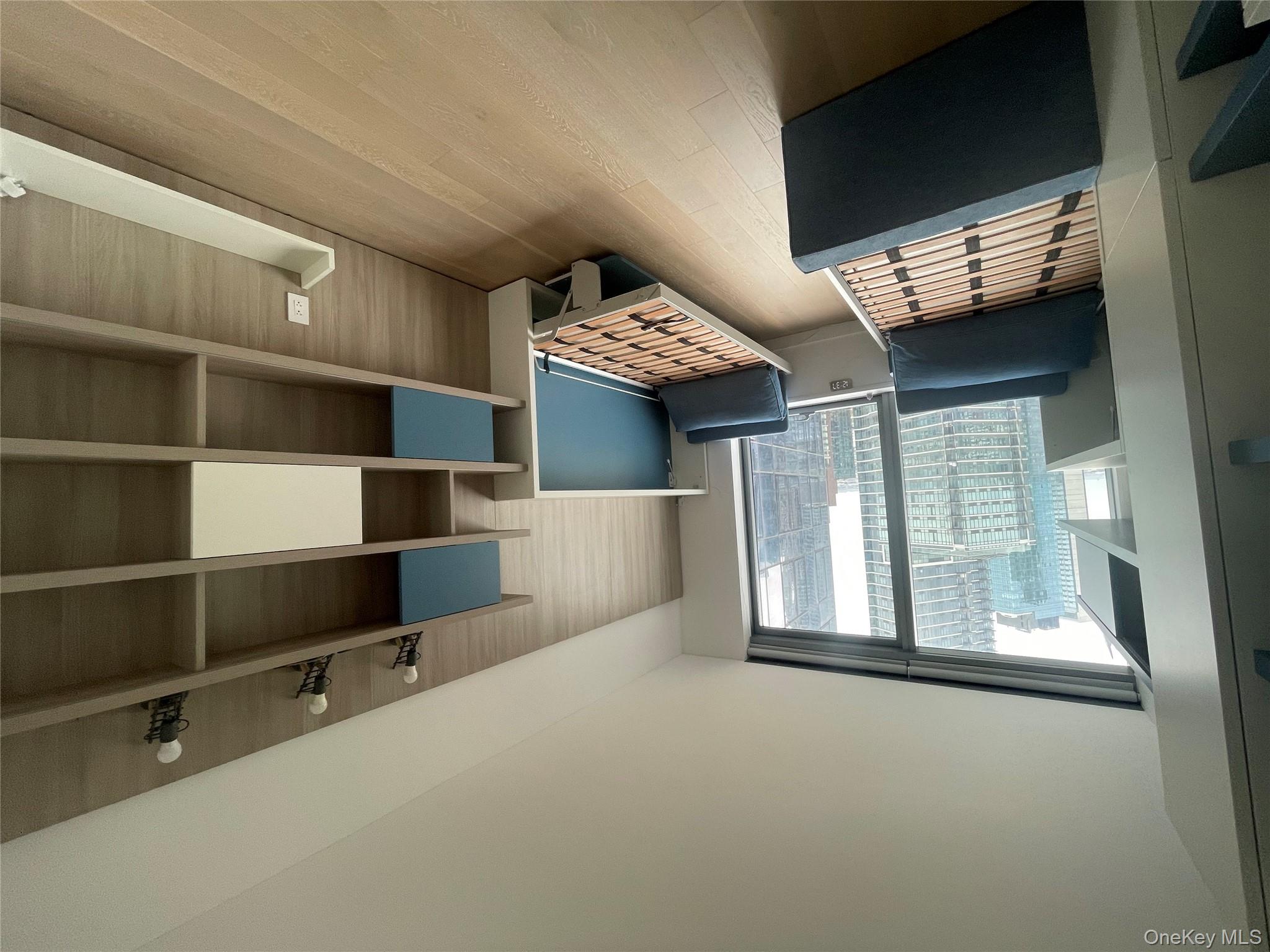 3 Court Square Queens, NY 11101 - Photo 5 of 7 a view of workspace with wooden floor space