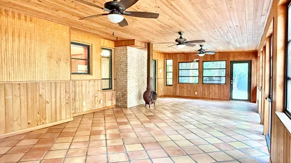 a view of an empty room and window