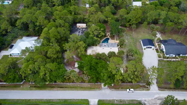a front view of a house with swimming pool