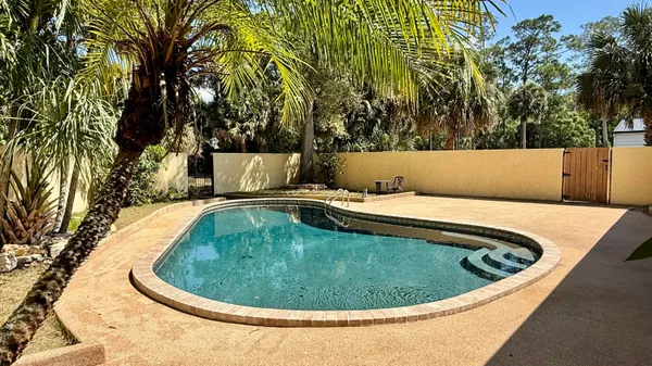 a view of outdoor space with swimming pool