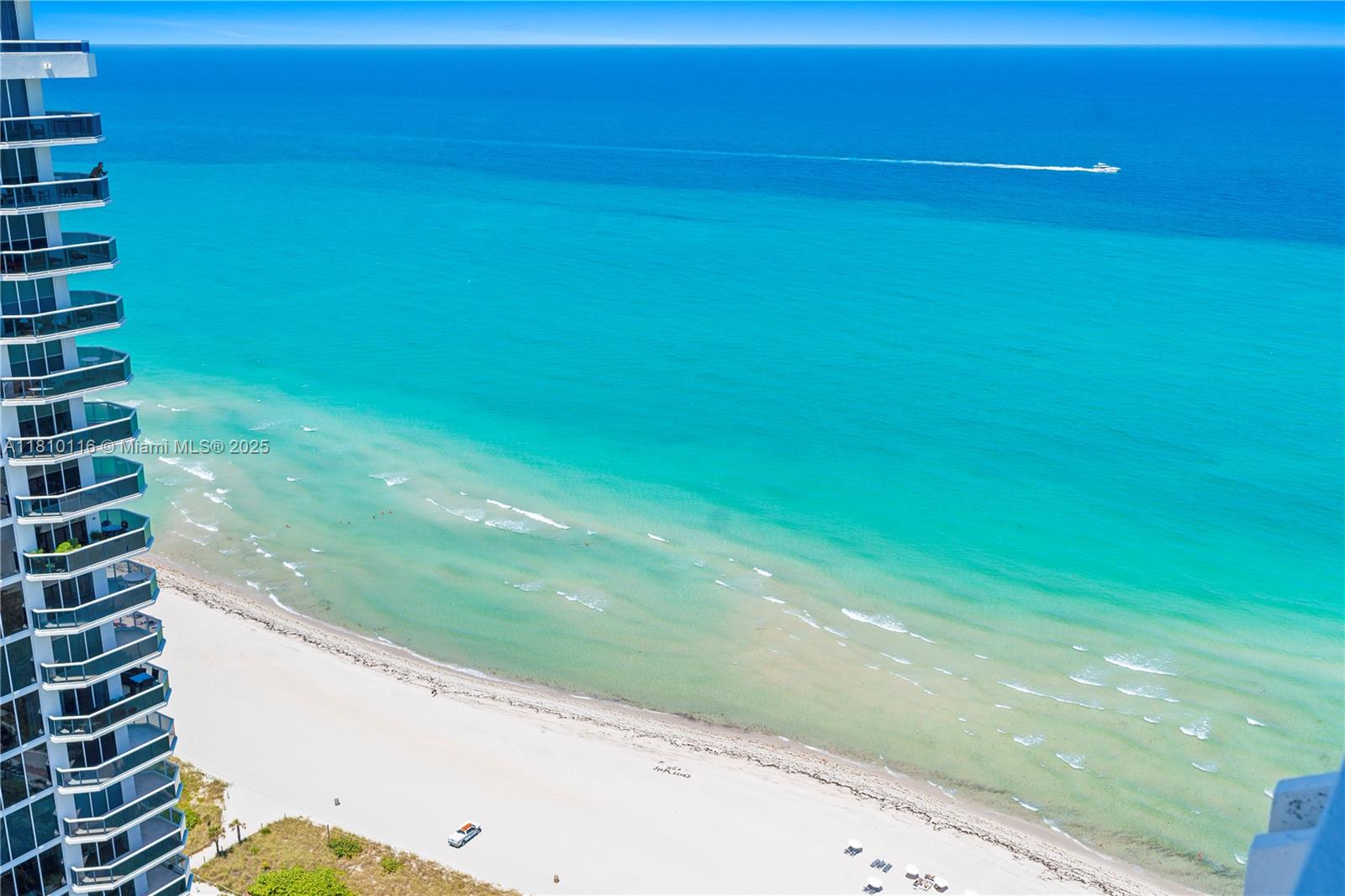 4775 Collins Avenue, Unit PH4107 Miami Beach, FL 33140 - Photo 2 of 62 a view of a yard with an empty space and a window