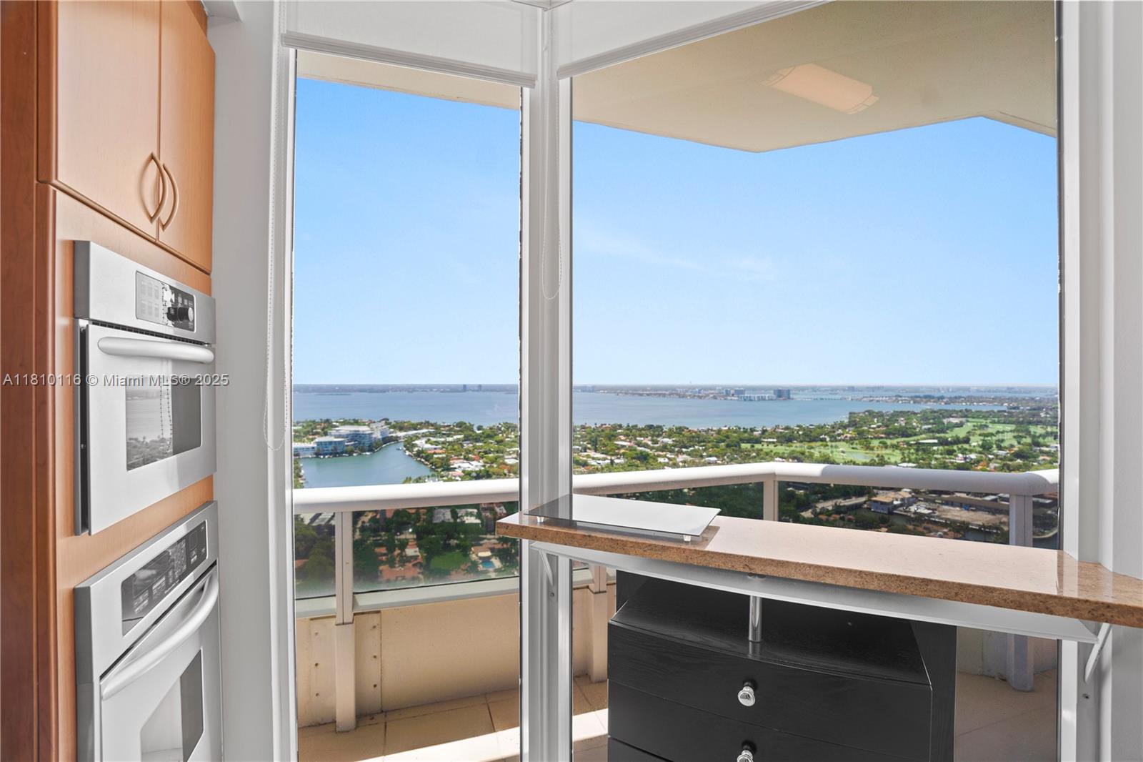 4775 Collins Avenue, Unit PH4107 Miami Beach, FL 33140 - Photo 21 of 62 a view of a balcony next to a yard