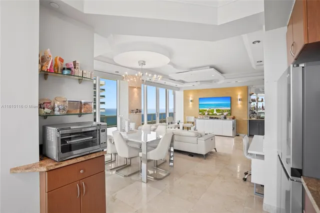 a bathroom with a sink a mirror and a shower