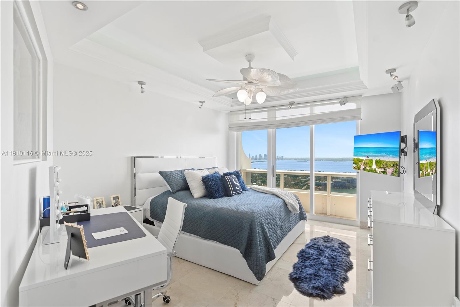 4775 Collins Avenue, Unit PH4107 Miami Beach, FL 33140 - Photo 27 of 62 a bedroom with furniture and a large window