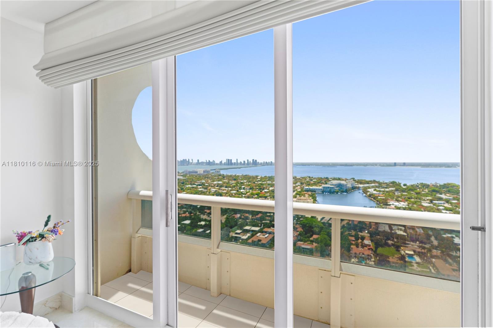 4775 Collins Avenue, Unit PH4107 Miami Beach, FL 33140 - Photo 29 of 62 a view of a room with a large window
