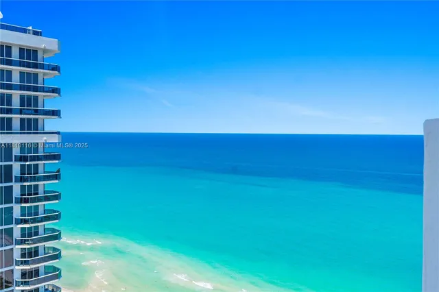 a view of a city with ocean view