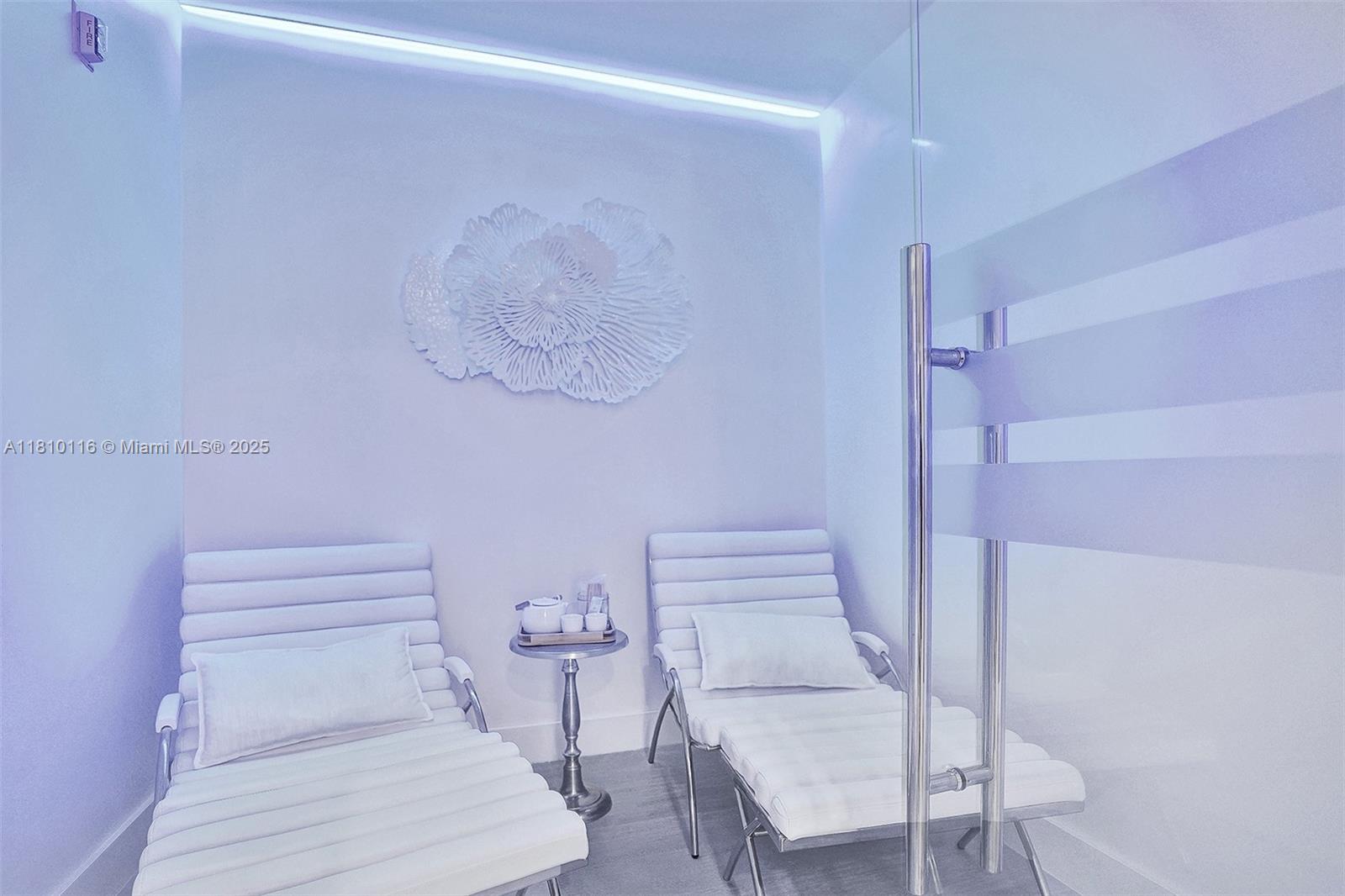 4775 Collins Avenue, Unit PH4107 Miami Beach, FL 33140 - Photo 59 of 62 a bathroom with a sink and toilet