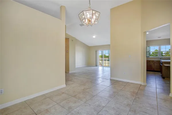 a view of a livingroom with a kitchen