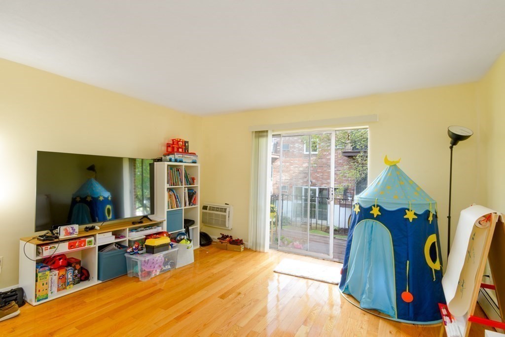 20 Westgate Road, Unit 4 Chestnut Hill, MA 02467 - Photo 3 of 16 a view of a room with gym equipment