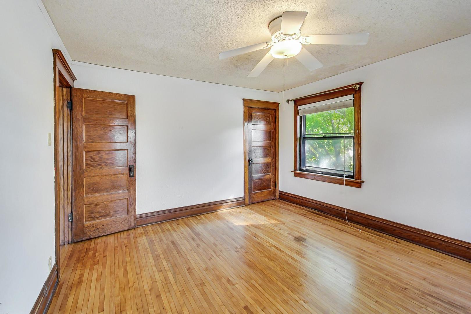 37 7th Avenue La Grange, IL 60525 - Photo 14 of 45 wooden floor in an empty room with a window