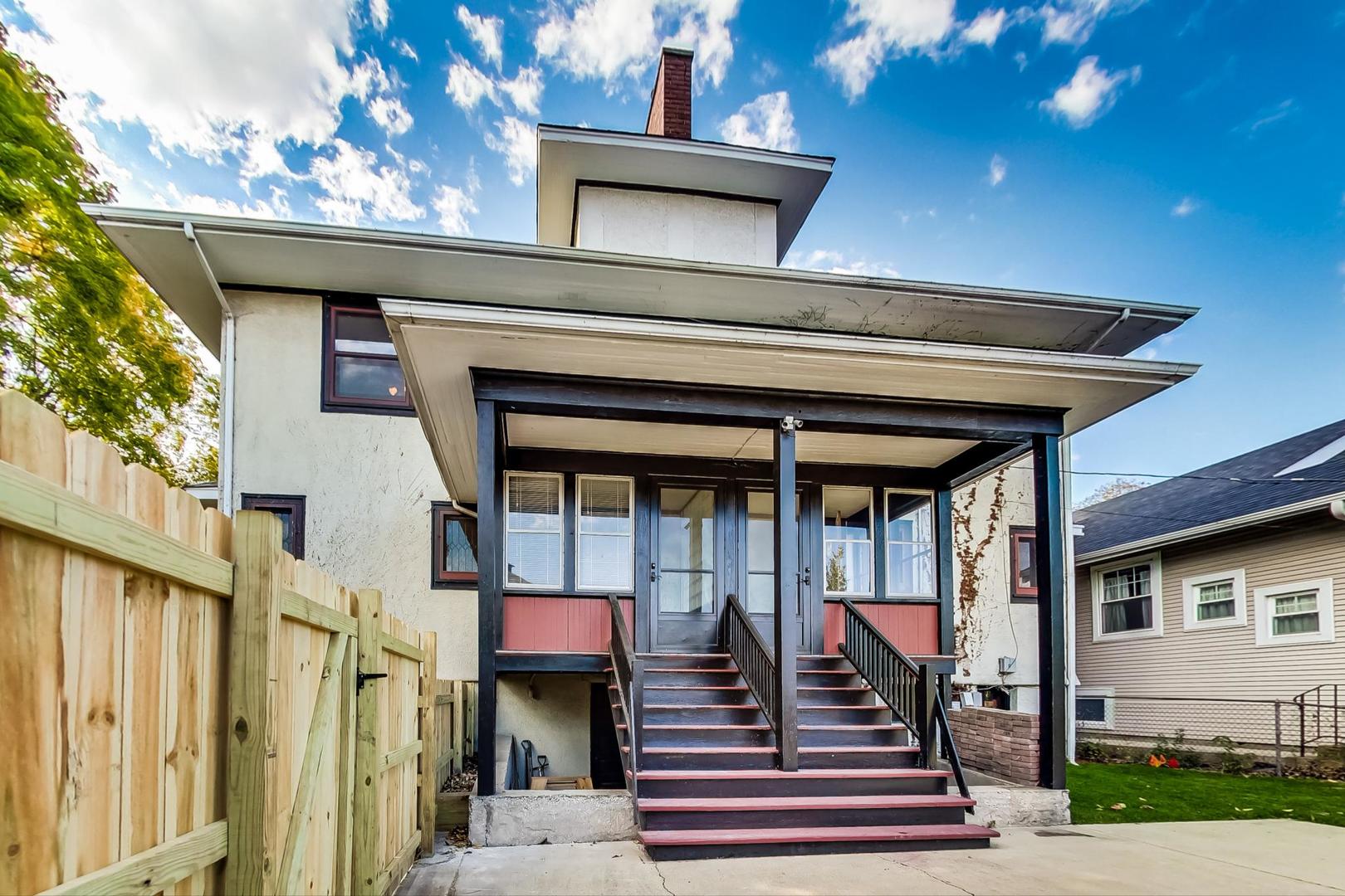 37 7th Avenue La Grange, IL 60525 - Photo 35 of 45 a front view of a house with a small yard