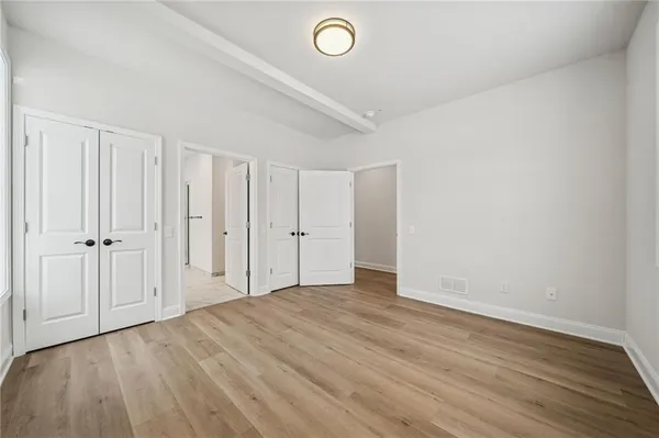 a view of a livingroom with wooden floor