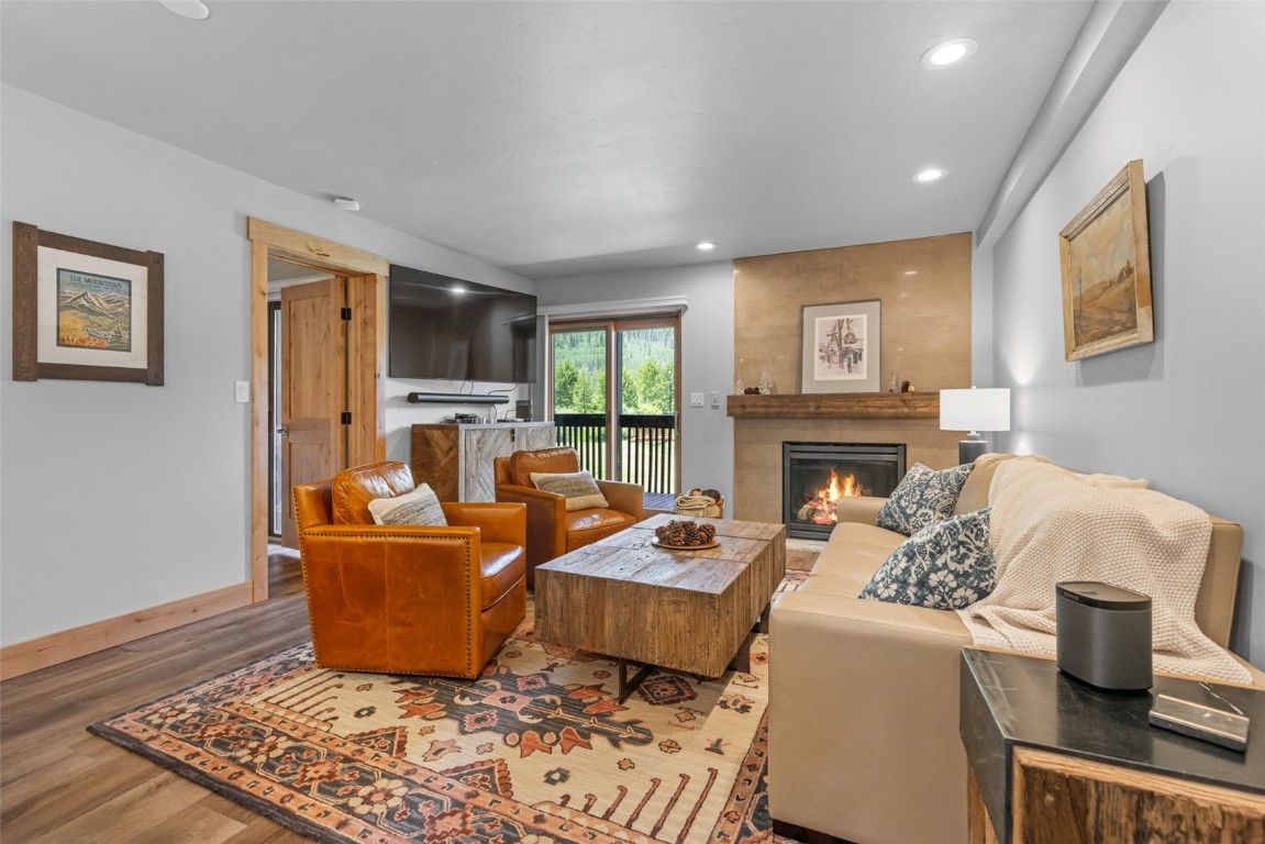 500 Bills Ranch Road, Unit 161 Frisco, CO 80443 - Photo 13 of 38 a living room with furniture and a fireplace