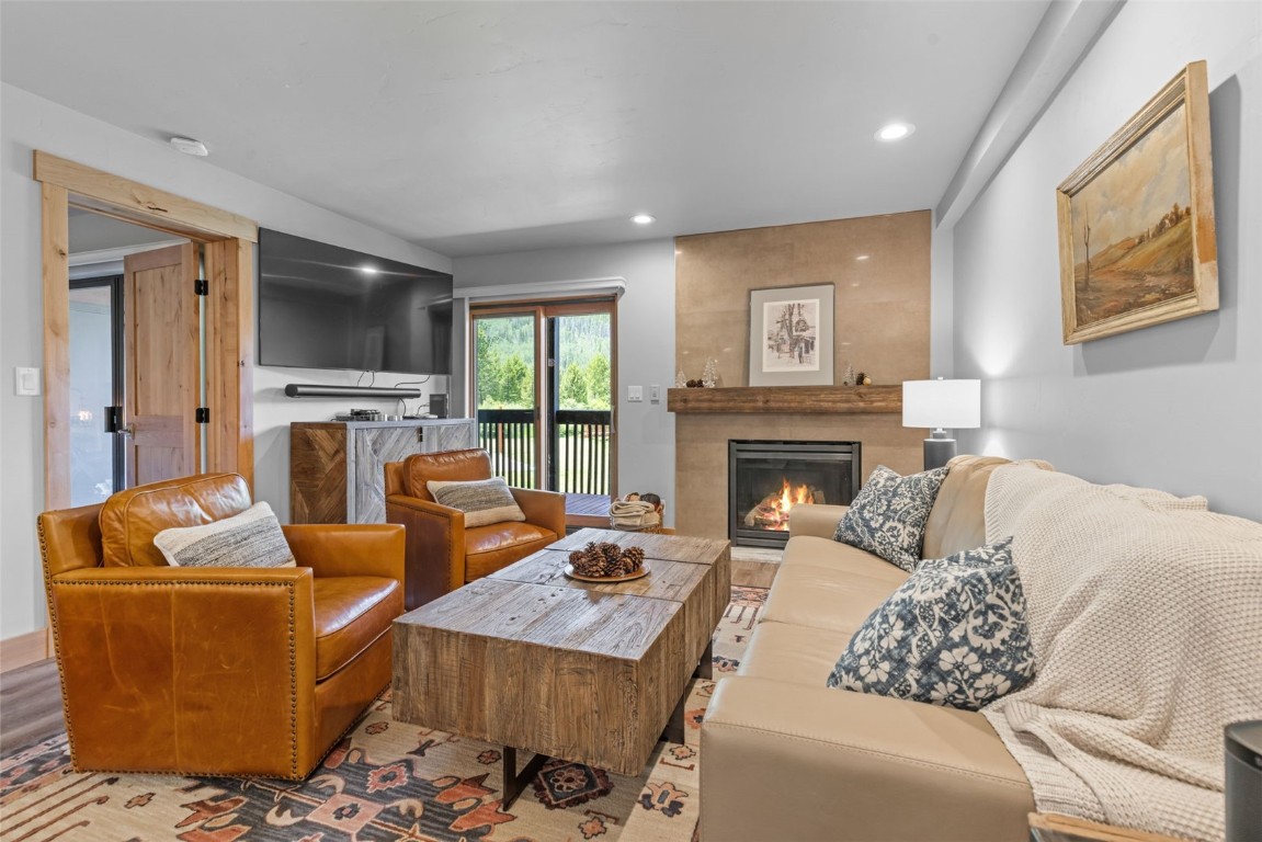 500 Bills Ranch Road, Unit 161 Frisco, CO 80443 - Photo 14 of 38 a living room with furniture and a fireplace