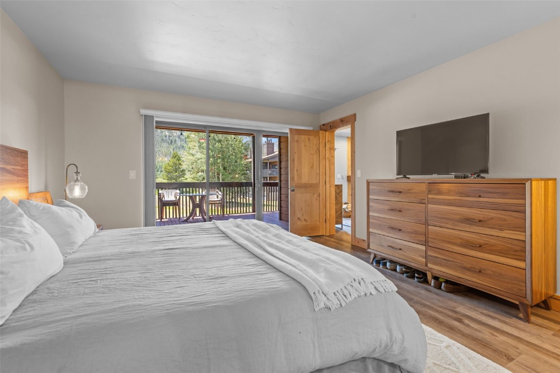 500 Bills Ranch Road, Unit 161 Frisco, CO 80443 - Photo 22 of 38 a bedroom with a bed and a television