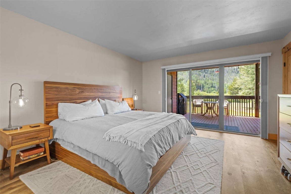 500 Bills Ranch Road, Unit 161 Frisco, CO 80443 - Photo 23 of 38 a bedroom with a bed and a large window
