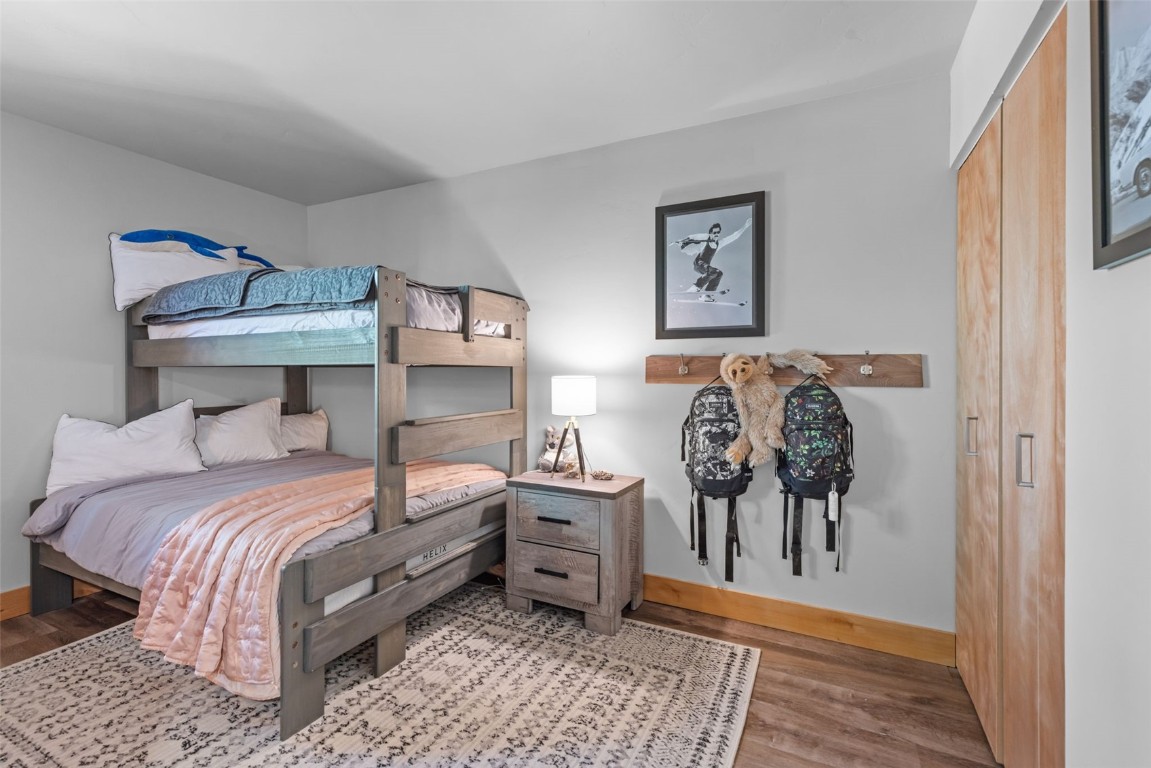 500 Bills Ranch Road, Unit 161 Frisco, CO 80443 - Photo 8 of 38 a bedroom with a bed and lamp