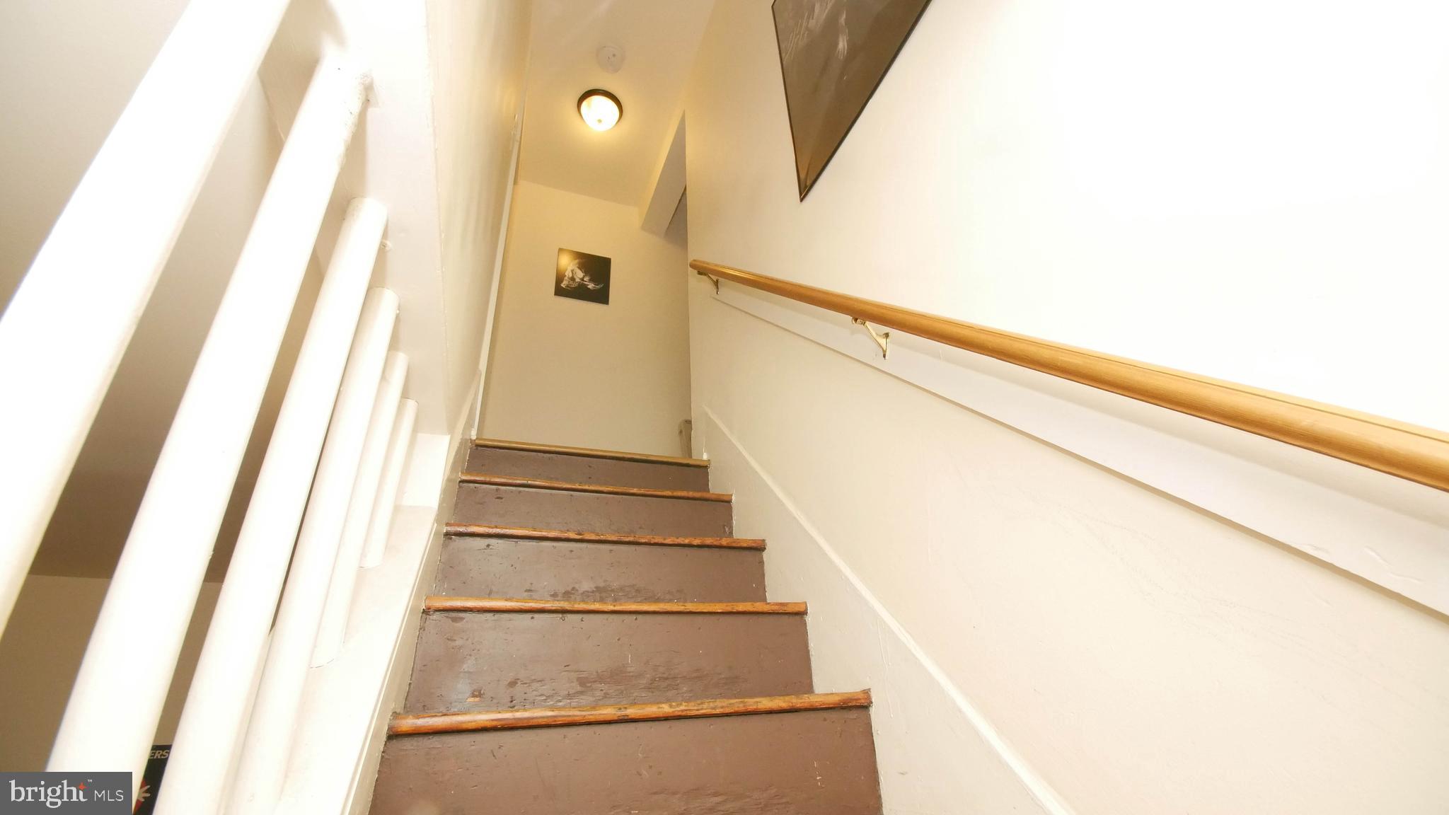 314 South Locust Street Hagerstown, MD 21740 - Photo 17 of 31 Stairs heading to 2nd floor