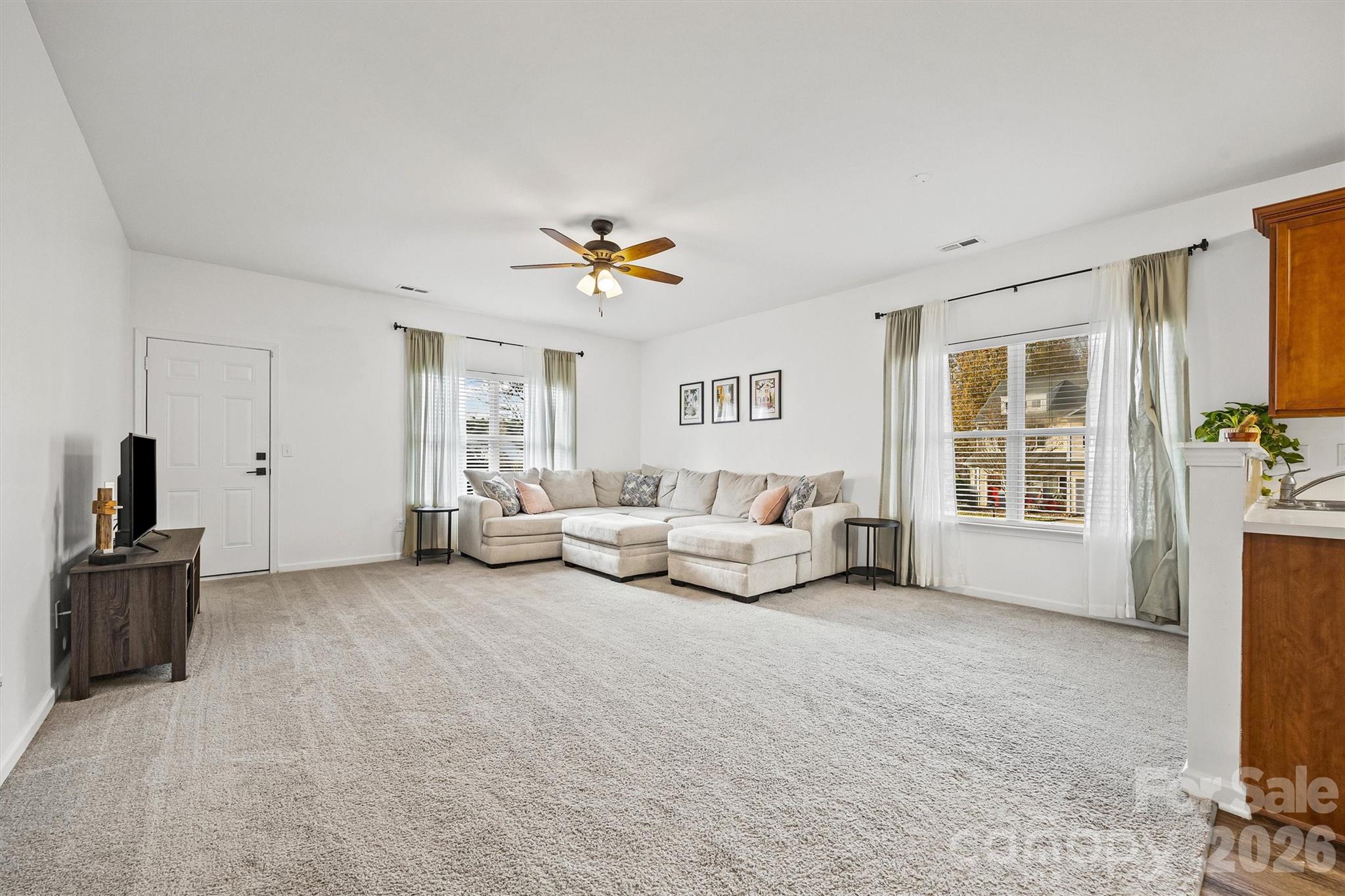 2133 Seabrook Lane Fort Mill, SC 29715 - Photo 11 of 28 a living room with furniture and a flat screen tv