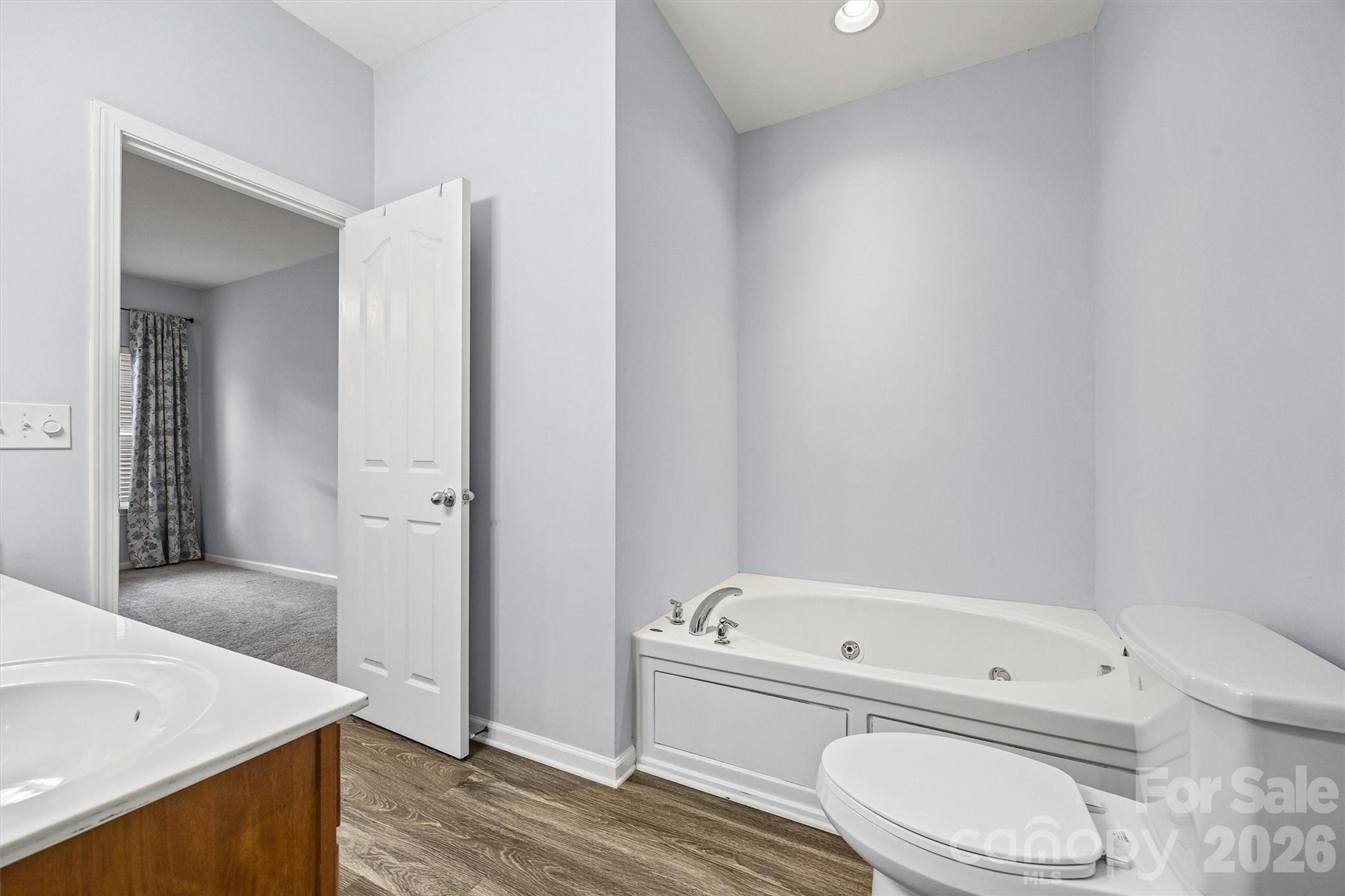 2133 Seabrook Lane Fort Mill, SC 29715 - Photo 16 of 28 a bathroom with a bathtub sink and toilet