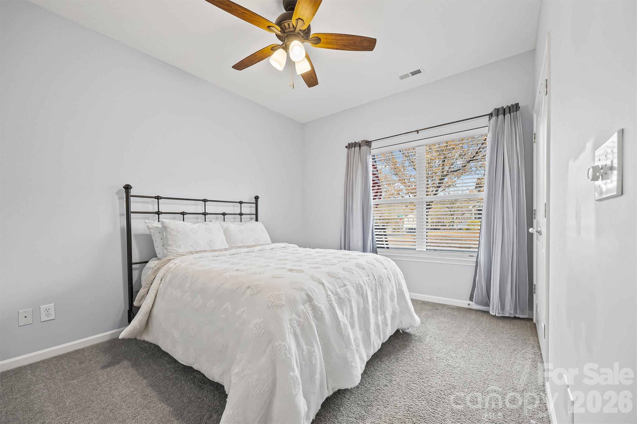 2133 Seabrook Lane Fort Mill, SC 29715 - Photo 20 of 28 a bedroom with a bed and window