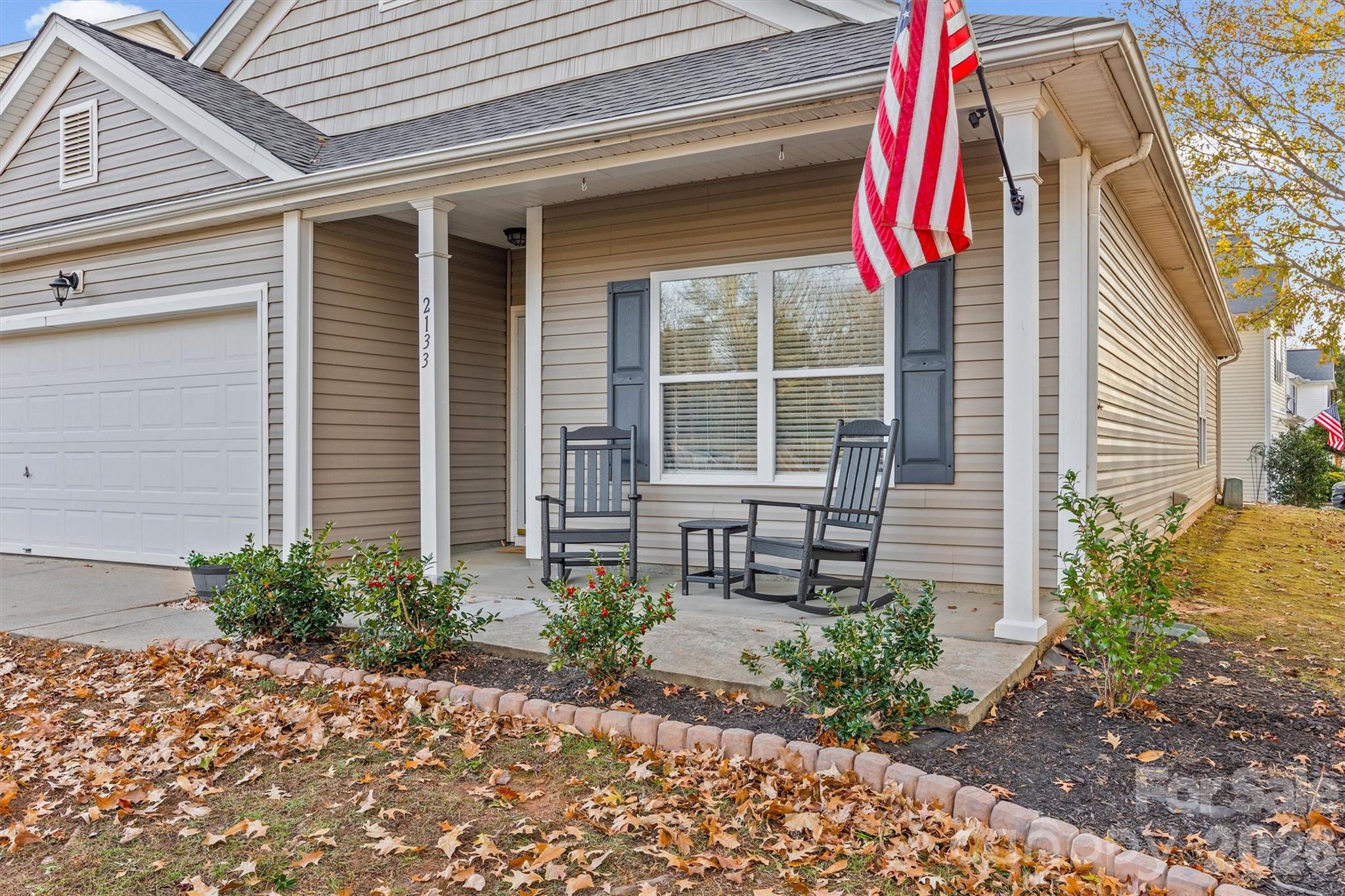 2133 Seabrook Lane Fort Mill, SC 29715 - Photo 2 of 28 a front view of a house with garden