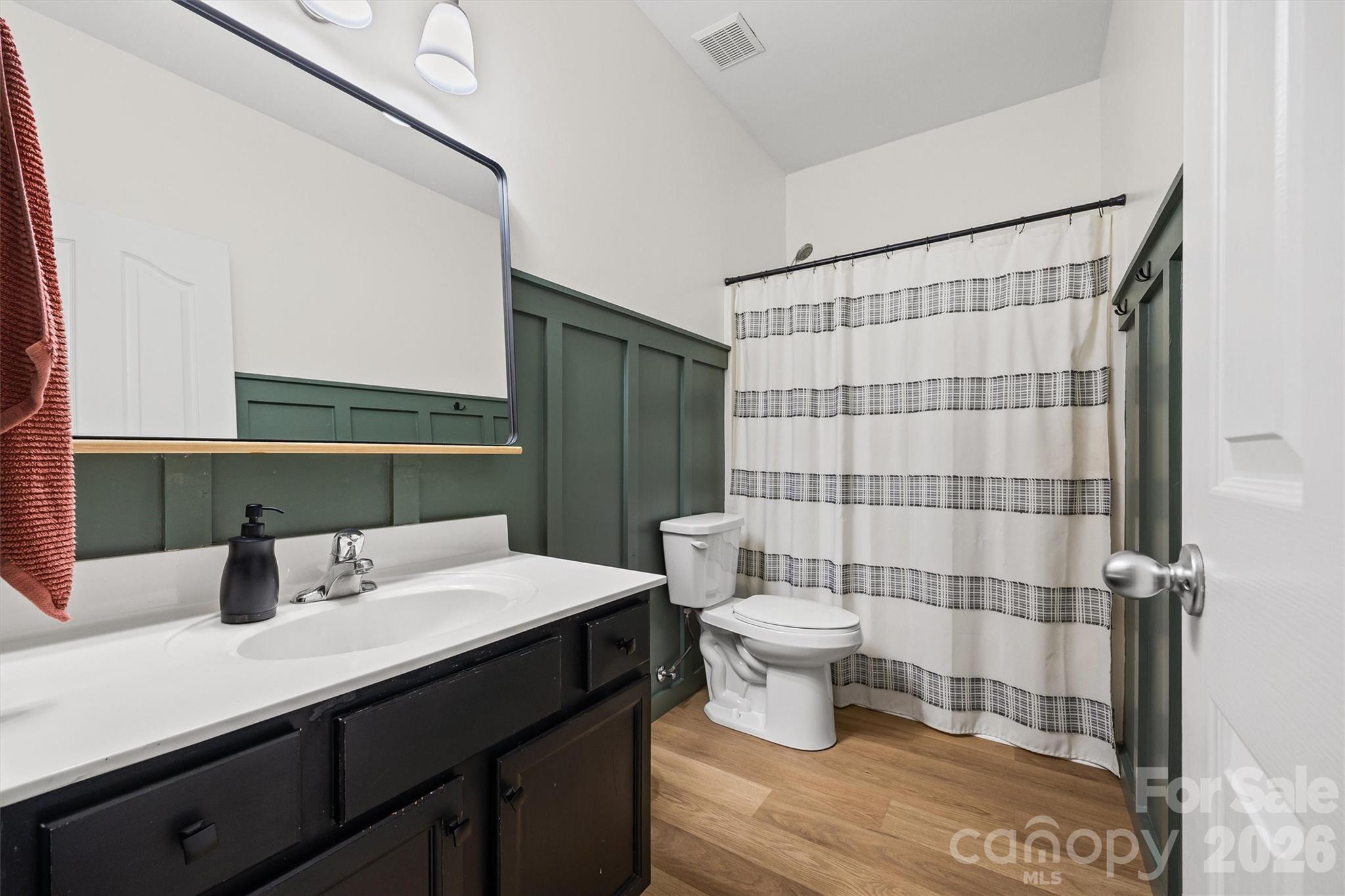 2133 Seabrook Lane Fort Mill, SC 29715 - Photo 22 of 28 a bathroom with a sink and a mirror