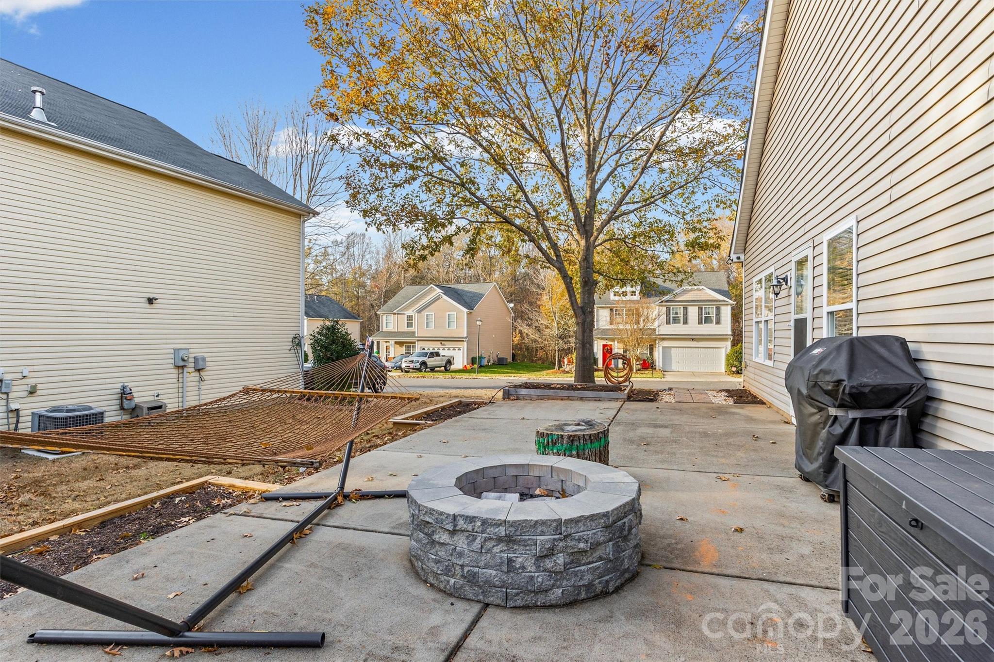 2133 Seabrook Lane Fort Mill, SC 29715 - Photo 25 of 28 a view of a house with backyard and sitting area