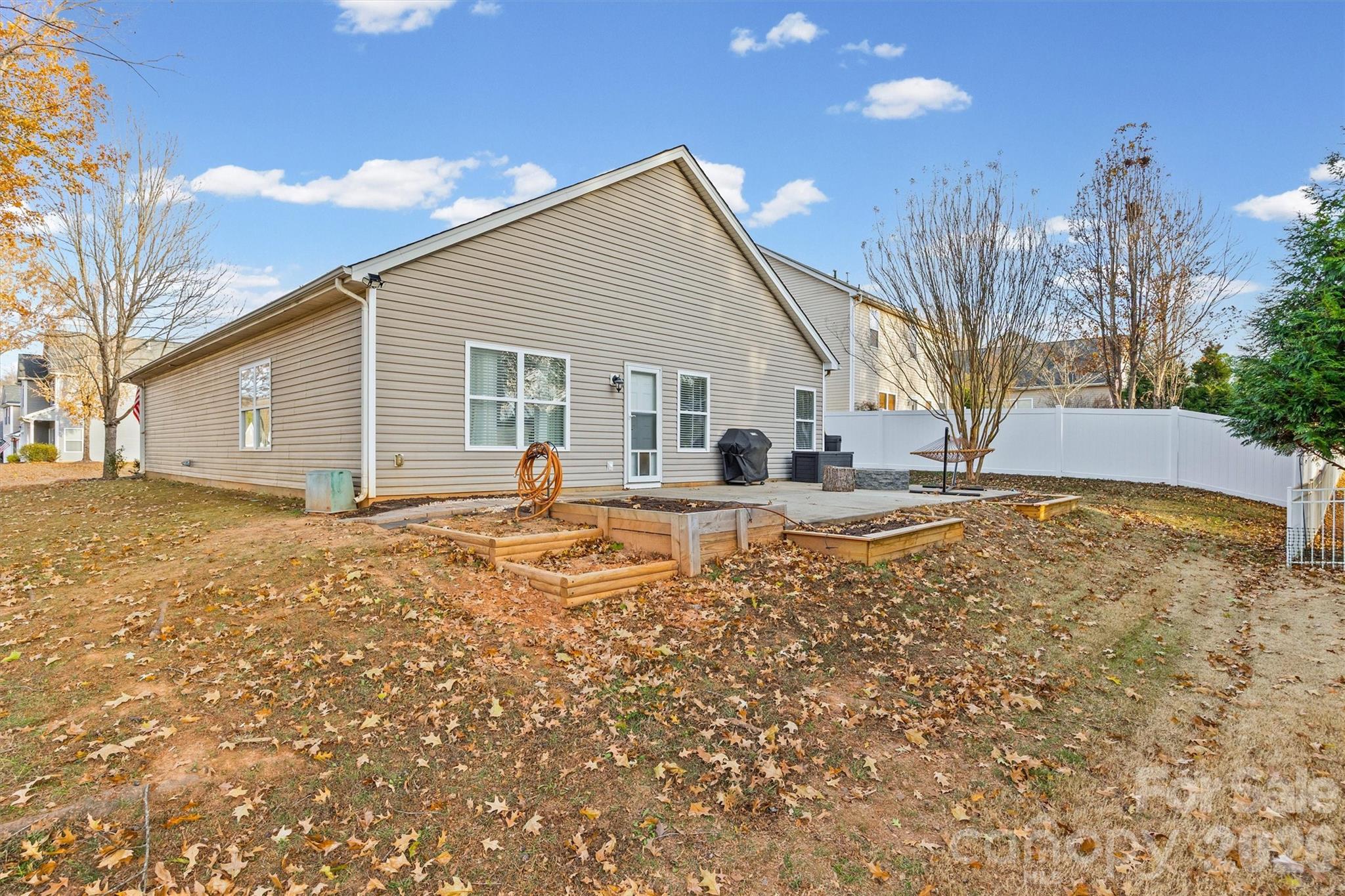 2133 Seabrook Lane Fort Mill, SC 29715 - Photo 26 of 28 a view of house with backyard and trees