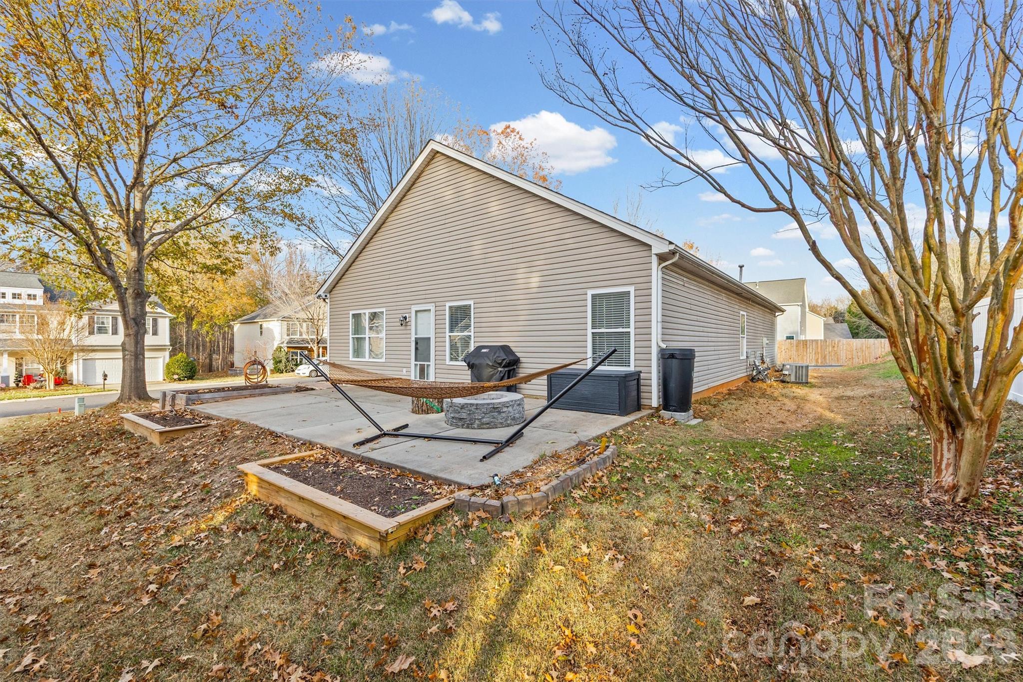 2133 Seabrook Lane Fort Mill, SC 29715 - Photo 27 of 28 a view of a backyard with a sitting area