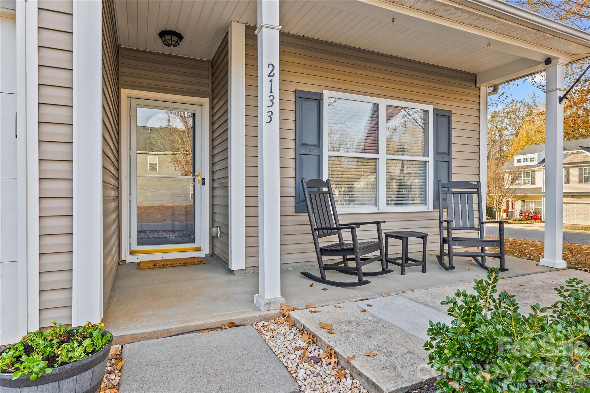 2133 Seabrook Lane Fort Mill, SC 29715 - Photo 3 of 28 a view of a front door and dining chair