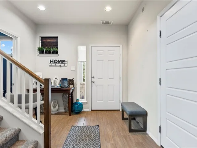 a view of a livingroom with furniture and workspace