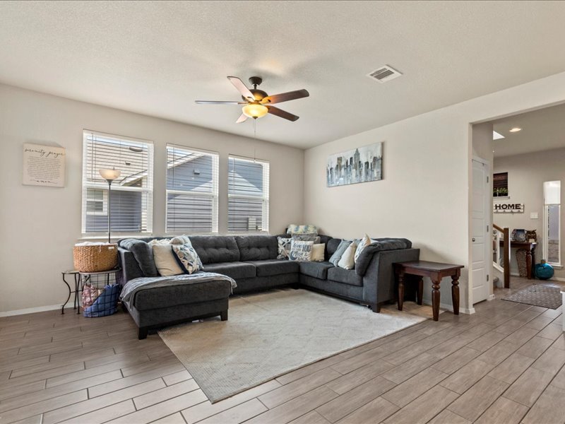204 Lake Placid Run Elgin, TX 78621 - Photo 5 of 19 a living room with furniture and a large window