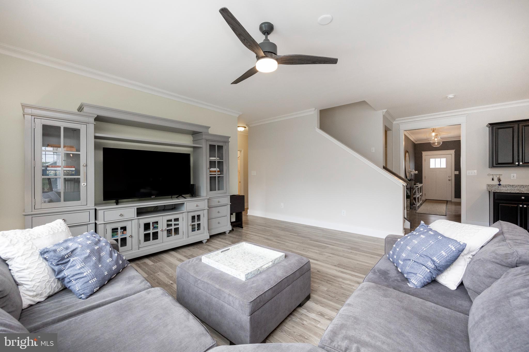 45 Nichols Mill Road Downingtown, PA 19335 - Photo 15 of 47 a living room with furniture and a flat screen tv